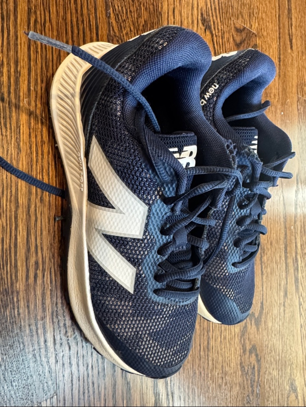 New Balance Navy & White turf Sneakers